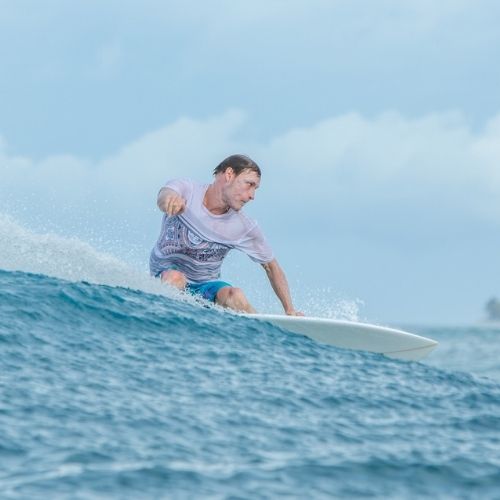 Bradley Hook surfing a wave in Fiji