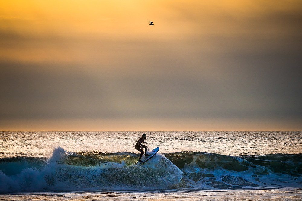 sunset surfing in norway