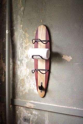 Surfboard towel holder