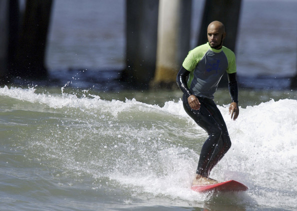 Ben Kenney surfing