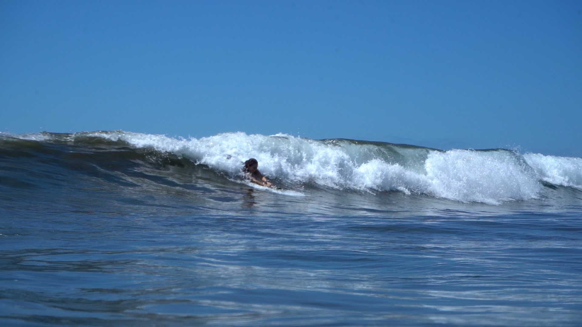 How to Bodysurf with a Handboard: A Beginner's Guide