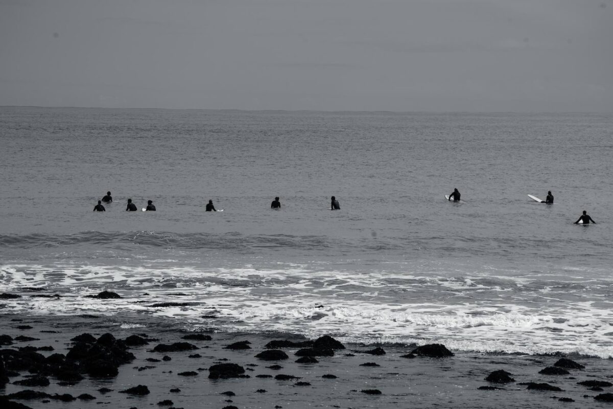 A crowded surf spot in Raglan, New Zealand – image