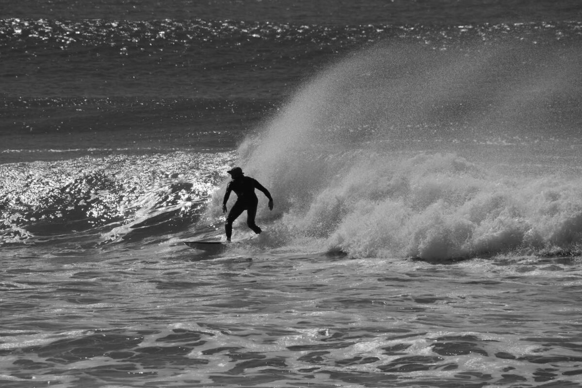 A surfer riding the wave - image