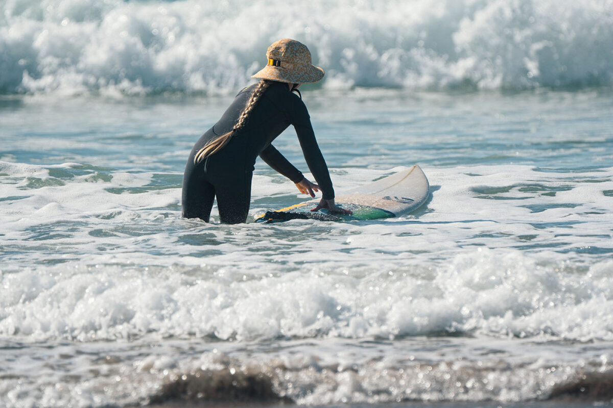 Surfer Girl Surfing
