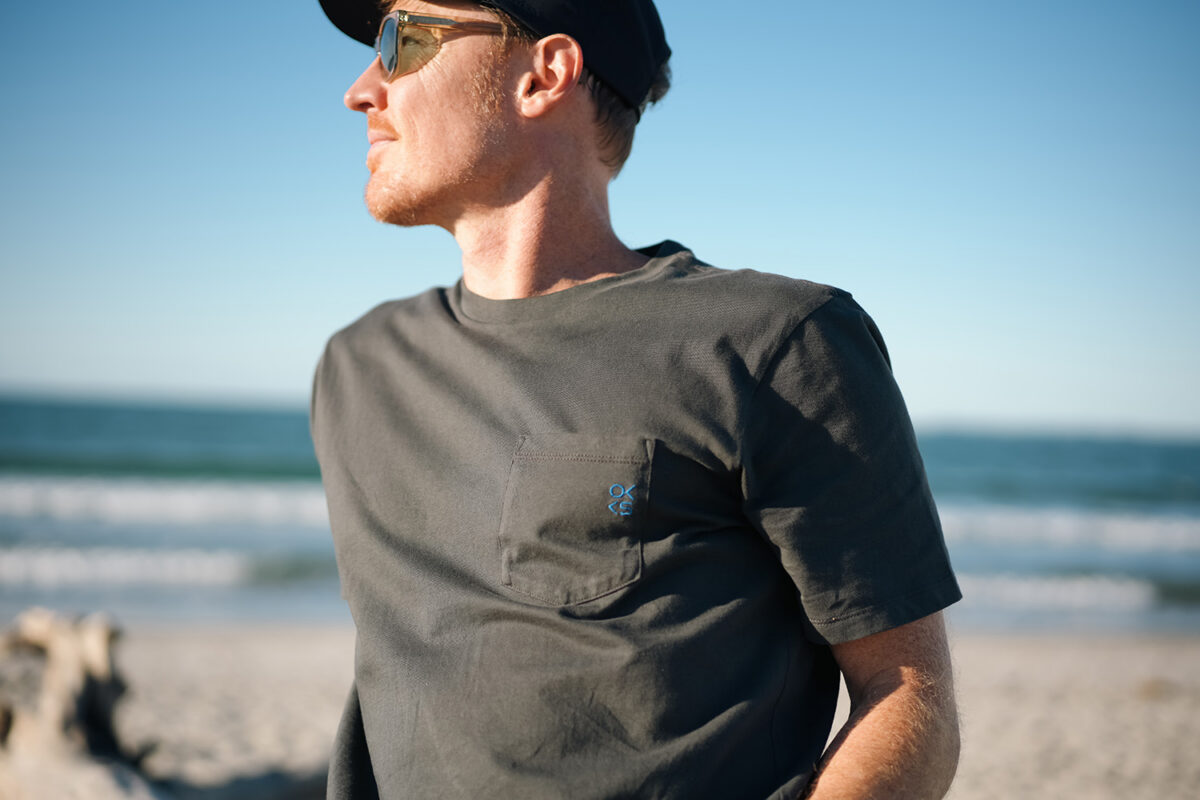 Brad wearing the Outerknown OK KS Pocket Tee in Charcoal