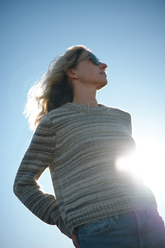 Geniya styling the Outerknown Horizon Sweater with jeans