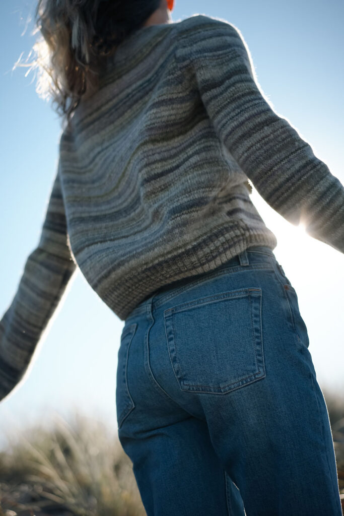 Detail of the Outerknown Horizon Sweater ribbed cuffs and cropped crewneck fit